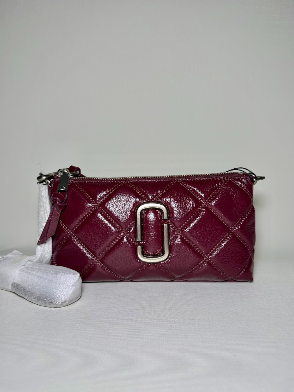 MARC JACOBS
The Quilted Top-Handle Mini Bag